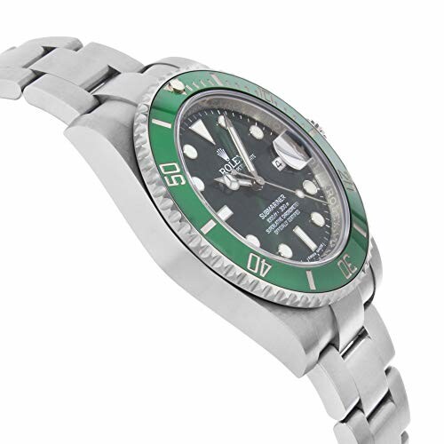 Luxury dive watch with green bezel and metal bracelet