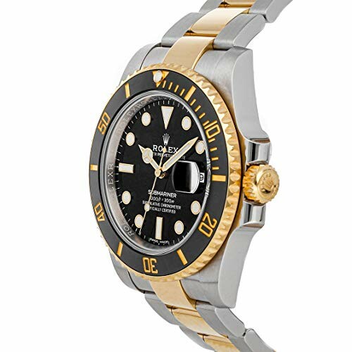 Two-tone luxury dive watch with black and gold bezel